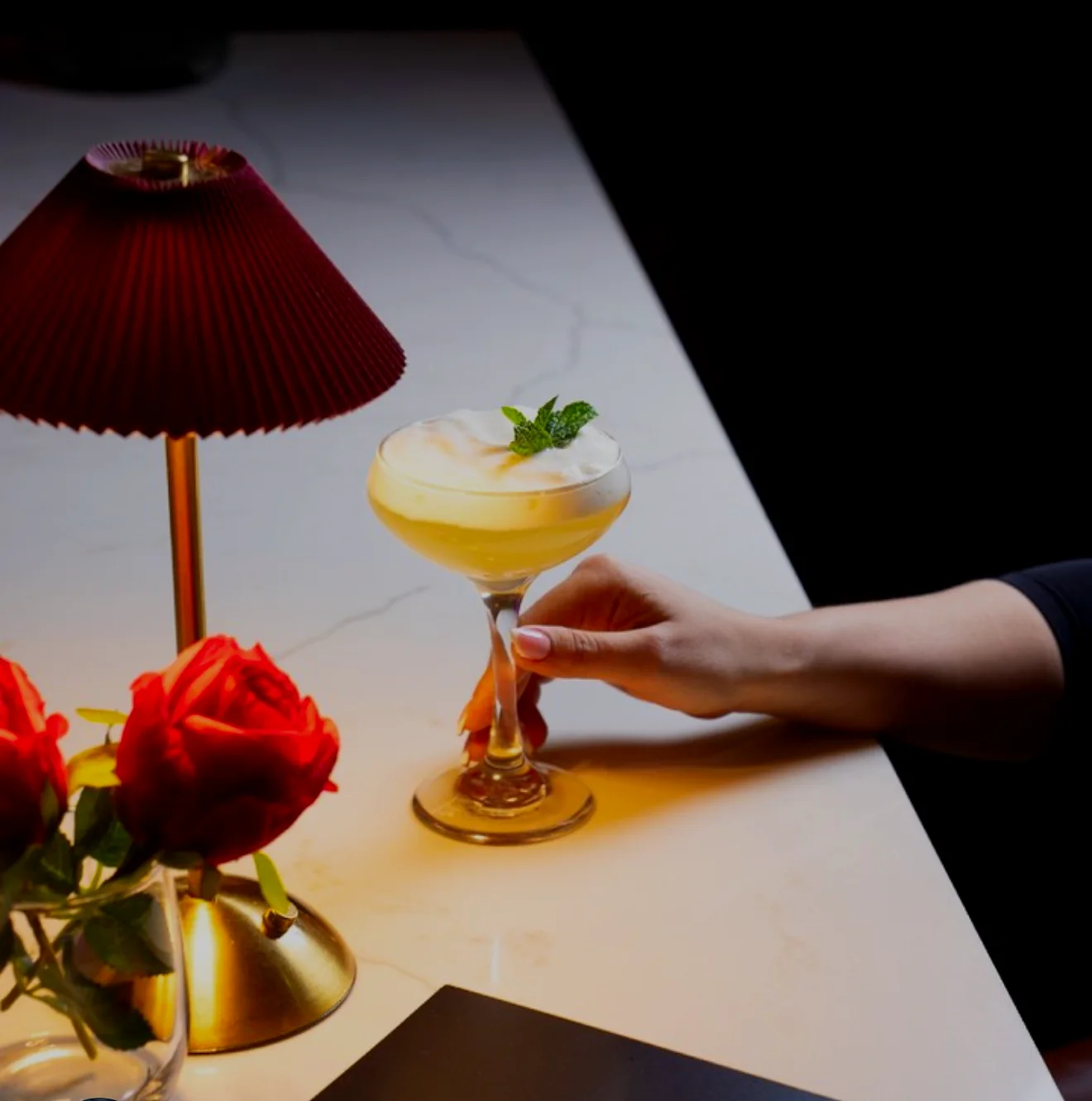 Mango Island Mirage cocktail on the marble counter